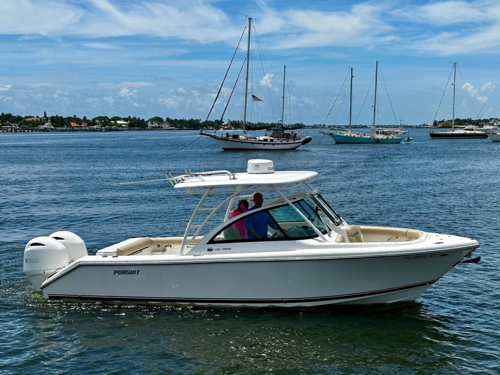 2019-pursuit-dc-265-dual-console-power-9403705-20240802053731440-1_XLARGE.jpg - Shop and buy used or new boats at Best Selling Boats.